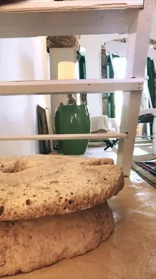 a group of cookies sitting on top of a table at Hypate, traditional island cottage in Halki