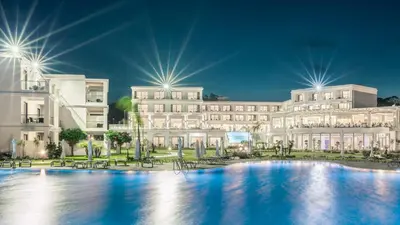 a rendering of a hotel with a large pool at Asterias Beach Resort in Afantou