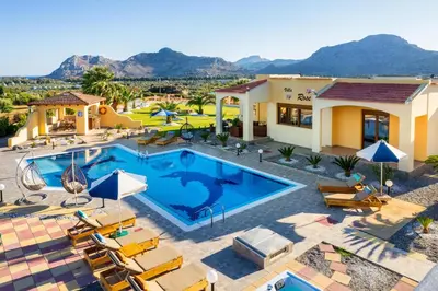 an image of a villa with a swimming pool at Villa Rose in Kolimbia