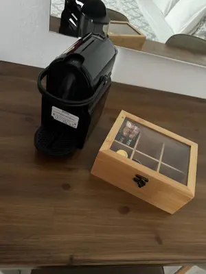 a coffee maker and a box on a table at Fedra Apartments Lindos in Líndos