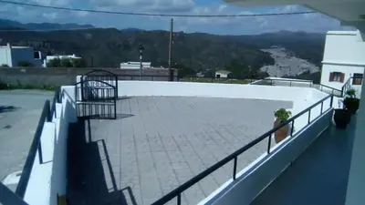 a balcony with a view of a mountain at Aggeli Village House in Asklipiḯon