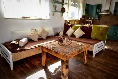 a living room with a couch and a table at Casa di Mare Stegna in Archangelos
