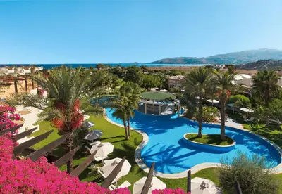 an aerial view of a resort with a swimming pool at Atrium Palace Thalasso Spa Resort And Villas in Kalathos