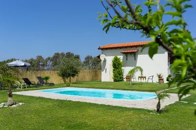 a pool in the backyard of a villa at M&B Luxury House in Theologos