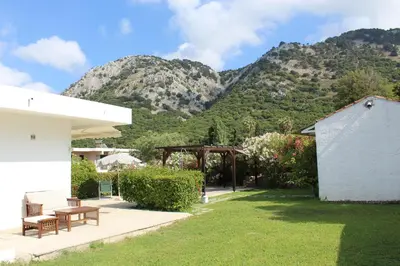 a view of the mountains from the backyard of a house at Salakos Mountain View Home in Sálakos