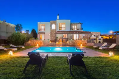 a house with a swimming pool in the yard at MarySol Luxury Villa in Gennadi