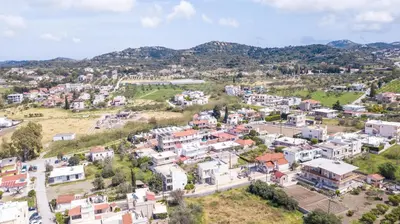 an aerial view of a small town with houses at EVA's House in Pastida
