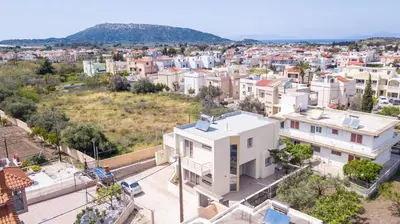 an aerial view of a city with houses at EVA's House in Pastida