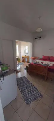 a living room with a bed and a couch at 