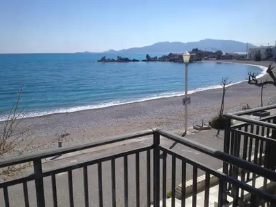 a view of a beach with the ocean at Horizon View Studio in Haraki