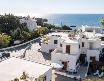 an aerial view of a white house and the ocean at Christine Villa Pefkos in Pefki Rhodes