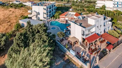 an aerial view of a house with a swimming pool at Bright Star in Faliraki