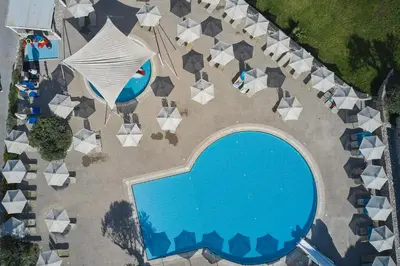 an overhead view of a swimming pool at a resort at Atlantica Mikri Poli Rhodes in Kolimbia