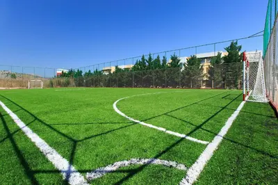 an empty soccer field with a goal at Atlantica Mikri Poli Rhodes in Kolimbia