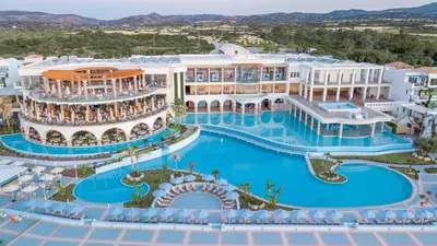 an aerial view of a resort with a swimming pool at Atrium Prestige Thalasso Spa Resort & Villas in Lachania