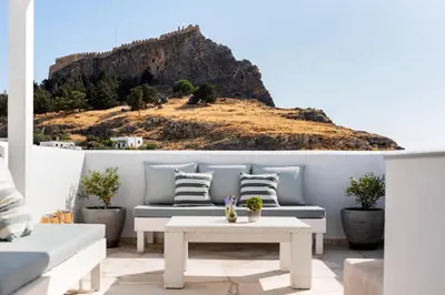 a living room with a view of a mountain at Lindian Polis in Líndos
