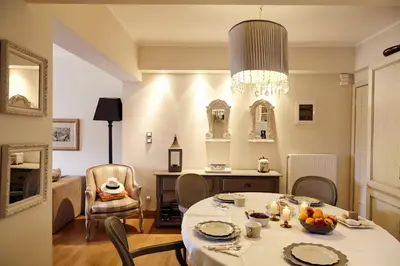 a dining room with a table and chairs at Unique Apartment in the Heart of the City in Rhodes Town