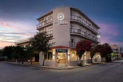 a building with a store on the side of a street at City Plus Rhodes Hotel in Rhodes Town