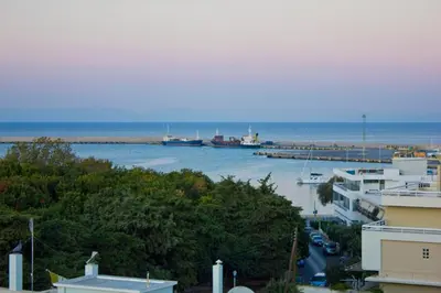 a view of a harbor with boats in the water at City Plus Rhodes Hotel in Rhodes Town