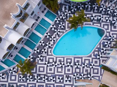 an overhead view of a swimming pool at a resort at Venezia Resort Hotel & Spa in Faliraki