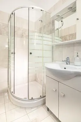 a bathroom with a shower and a sink at Salora Studio-Apartments in Archangelos