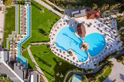 an overhead view of a building with a swimming pool at Kresten Palace Hotel in Kallithea Rhodes