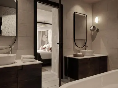 a bathroom with two sinks and a tub and a bed at Aulus Lindos Rhodes, All-Inclusive Resort, Curio Collection by Hilton in Kiotari