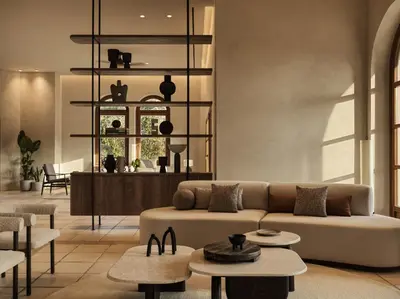 a living room with a couch and tables at Aulus Lindos Rhodes, All-Inclusive Resort, Curio Collection by Hilton in Kiotari