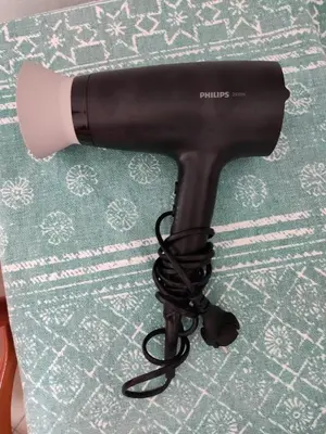 a hair dryer sitting on top of a table at Tilos Fantasy in Livadia