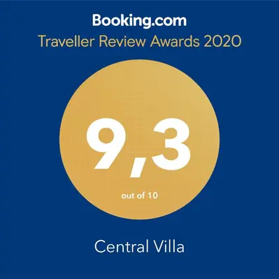 a yellow circle with the number nine and the text travel review awards at Villa Eleonora in Rhodes Town