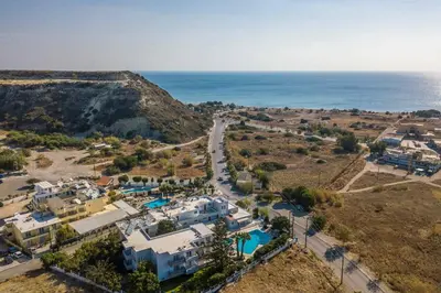 an aerial view of a resort and the ocean at Irinna Hotel-Apartments in Faliraki