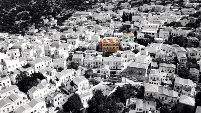 a black and white photo of a city with houses at Hotel Fiona Symi in Symi