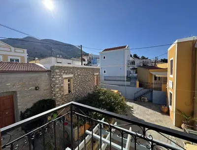 a view from the balcony of a apartment at Hotel Fiona Symi in Symi