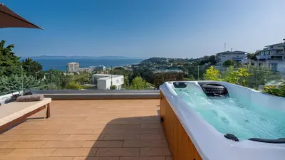 a bath tub sitting on top of a roof at FlyViewFlatsGOLD PrivateHotTub with SeaView in Rhodes Town