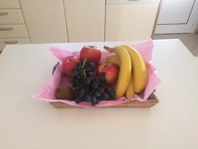 a basket of fruit on a table at Villa Melita Seafront in Pefki Rhodes