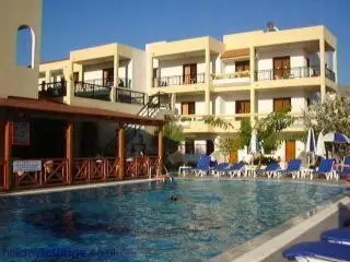 a large swimming pool in front of a hotel at Summer Memories Aparthotel in Pefki Rhodes