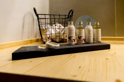 a group of bottles sitting on top of a table at Villa Myrto in Líndos