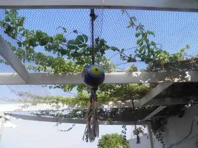 a ball hanging from the ceiling of a building at Sea House Lahania in Lachania