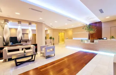 a lobby of a salon with a waiting room at Pefkos Beach Studios & Apartments in Pefki Rhodes