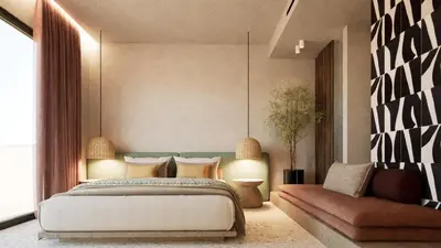 a bedroom with a large bed and a couch at Pefkos Beach Studios & Apartments in Pefki Rhodes