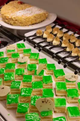 a plate of green and white food with a cake at Sol Cosmopolitan Rhodes in Ixia