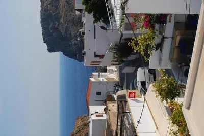 an overhead view of a building with trees and plants at Erato Apartments in Líndos