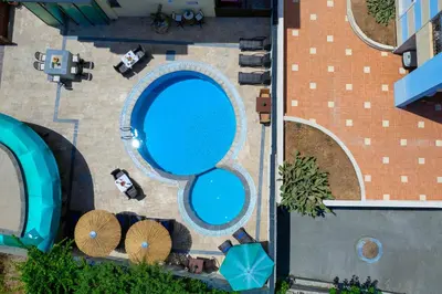 an overhead view of a swimming pool at a resort at Comfort Hotel Apartments in Rhodes Town