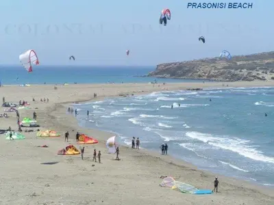 a group of people on a beach flying kites at Colonial Studio/Apartment in Faliraki