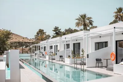 an image of a hotel with a swimming pool at Aiora Aqua Resort in Pefki Rhodes