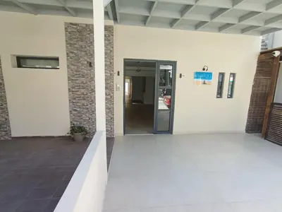 an empty lobby with a door in a building at Aialion studios & apartments - Steve Apartments in Rhodes Town