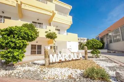 a sign that reads marula in front of a building at Maroula Studios in Faliraki