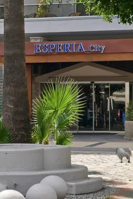 a building with a sign that reads esperanza city at Esperia City Hotel in Rhodes Town