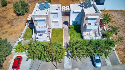 an overhead view of a house with cars parked in front at Haraki Stone Apartments in Haraki
