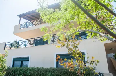 a building with a balcony in front of it at Stan&Family in Kalavárda